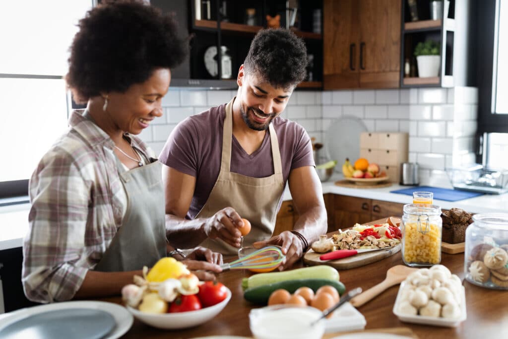 Couple in the kitchen cooking together