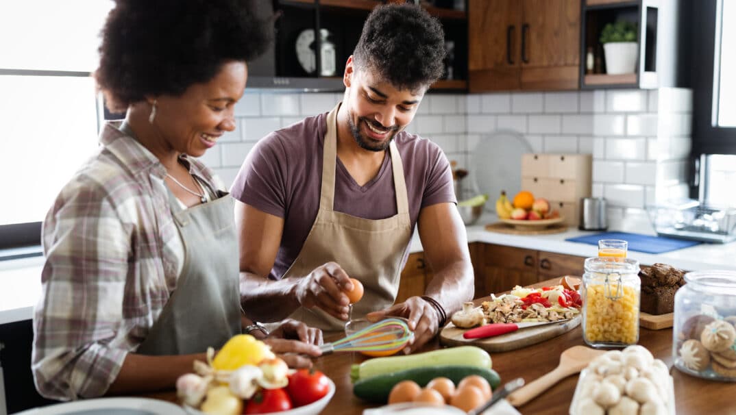 Couple in the kitchen cooking together