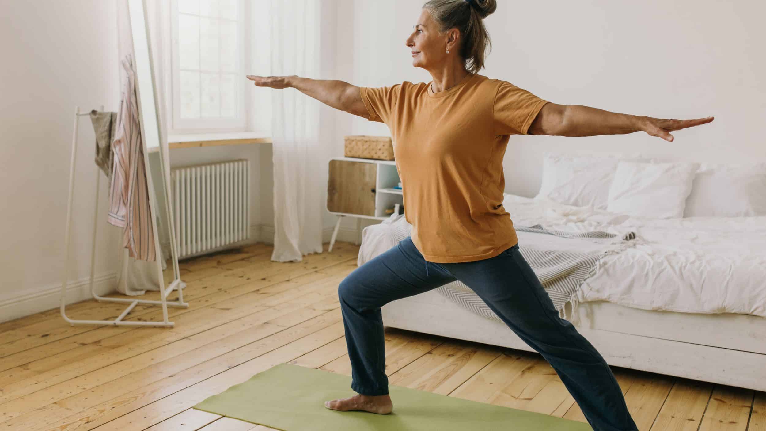Woman Doing Yoga in Warrior pose