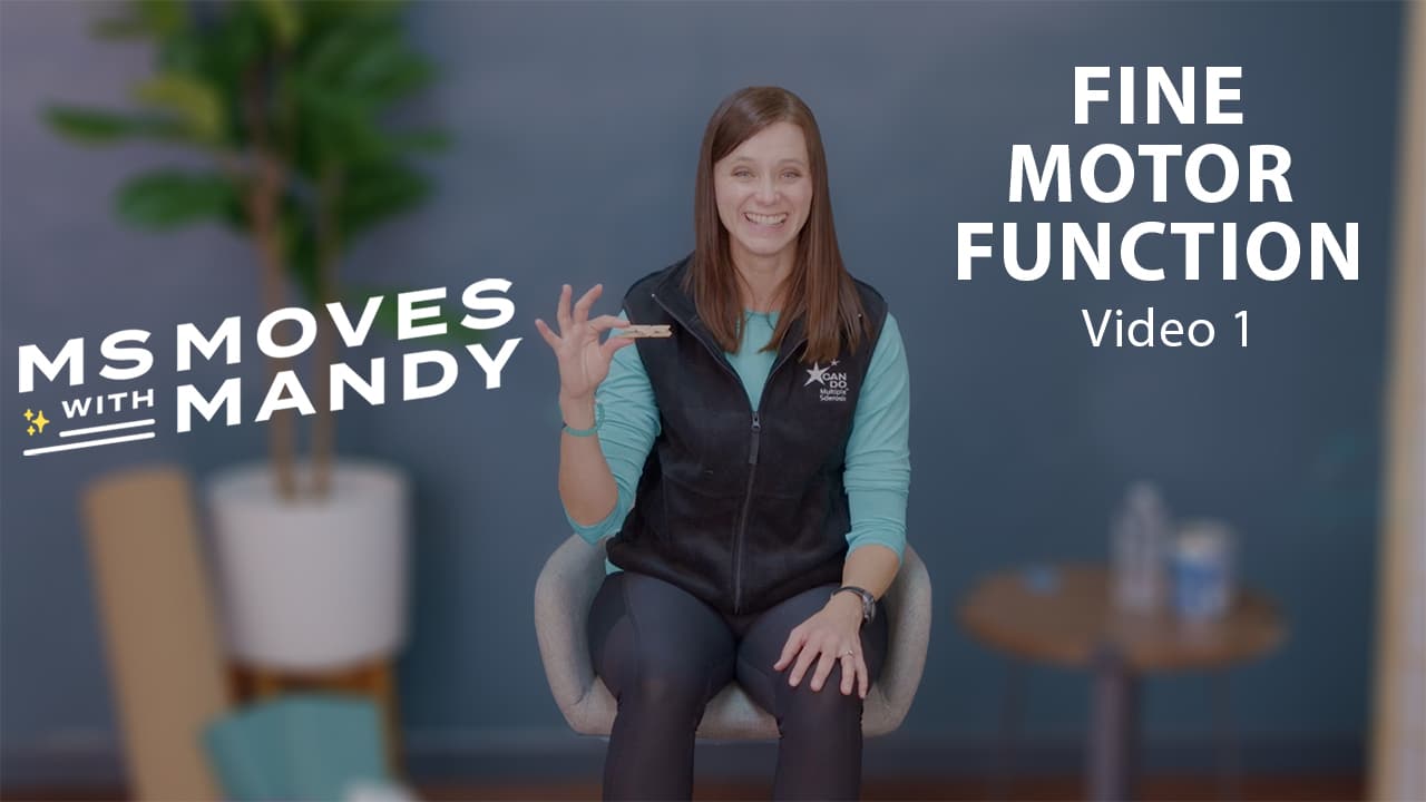 Physical therapist Mandy Rohrig Sitting holding a clothespin