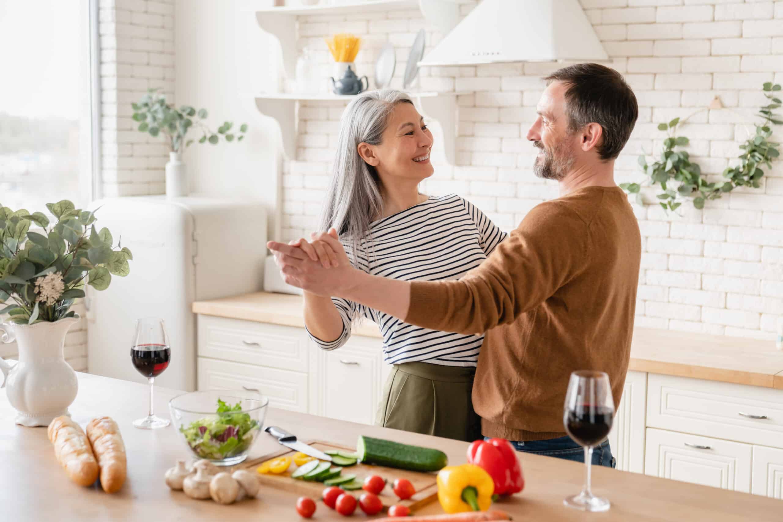 couple dancing in the kitchen