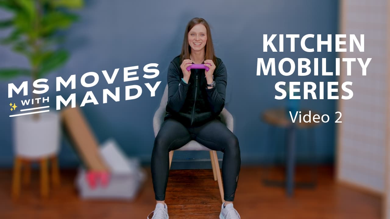 Physical therapist Mandy Rohrig sitting and holding a dumbell