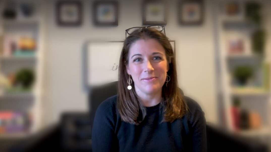 Psychologist Meghan Beier sitting in her office