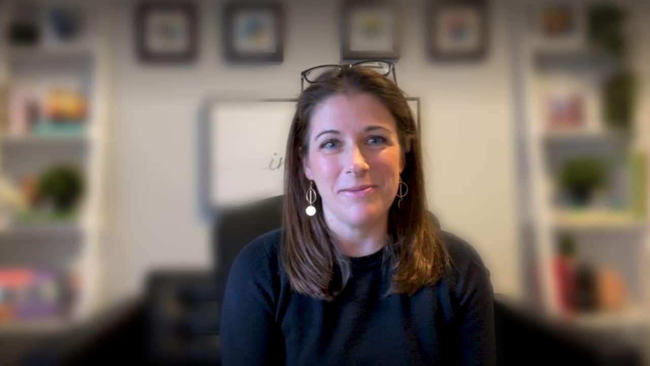 Psychologist Meghan Beier sitting in her office