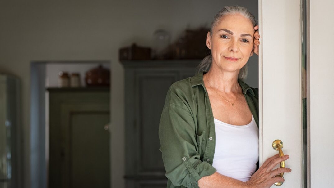 Serious but smiling mature woman