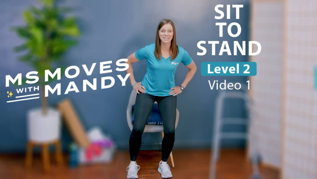 Physical therapist demonstrating a mini squat exercise for sit to stand strength