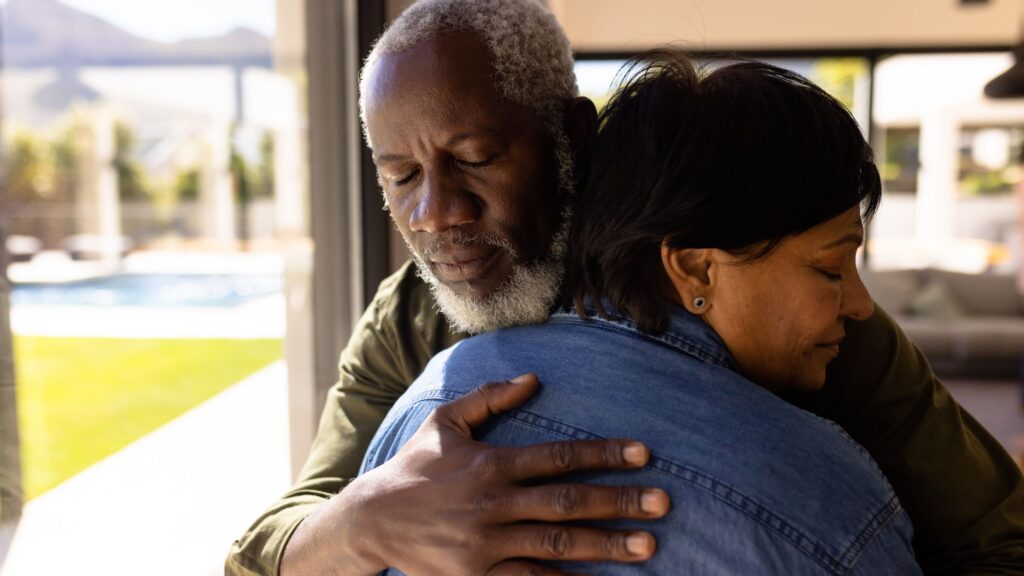 Man and woman embracing