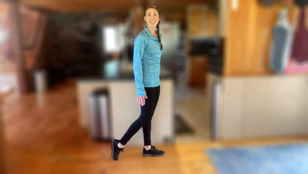 physical therapist demonstrating an exercise to improve walking on uneven ground