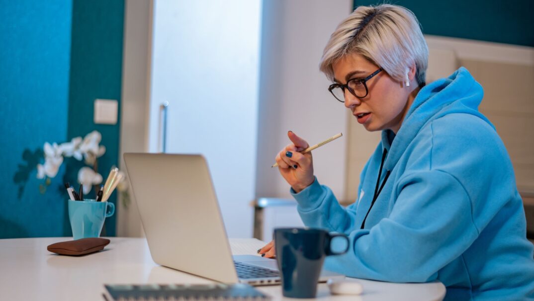 Woman working at a laptop
