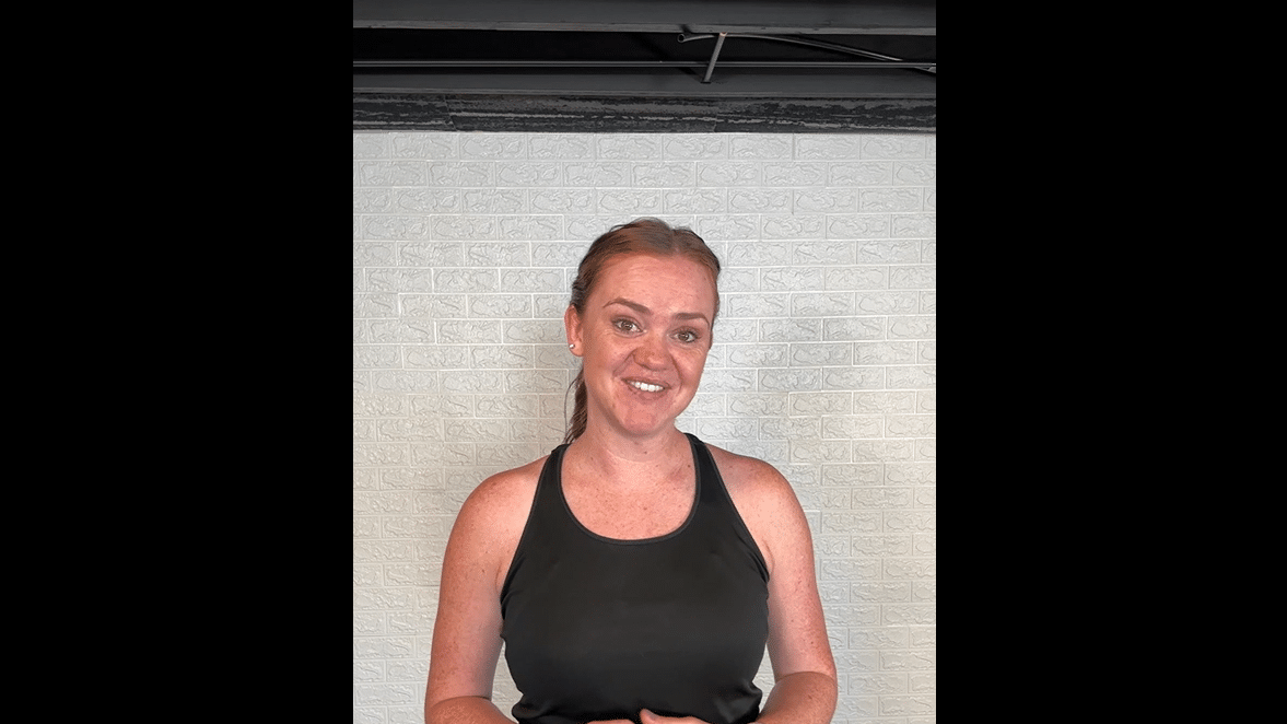 Emily Reilly Standing in a gym