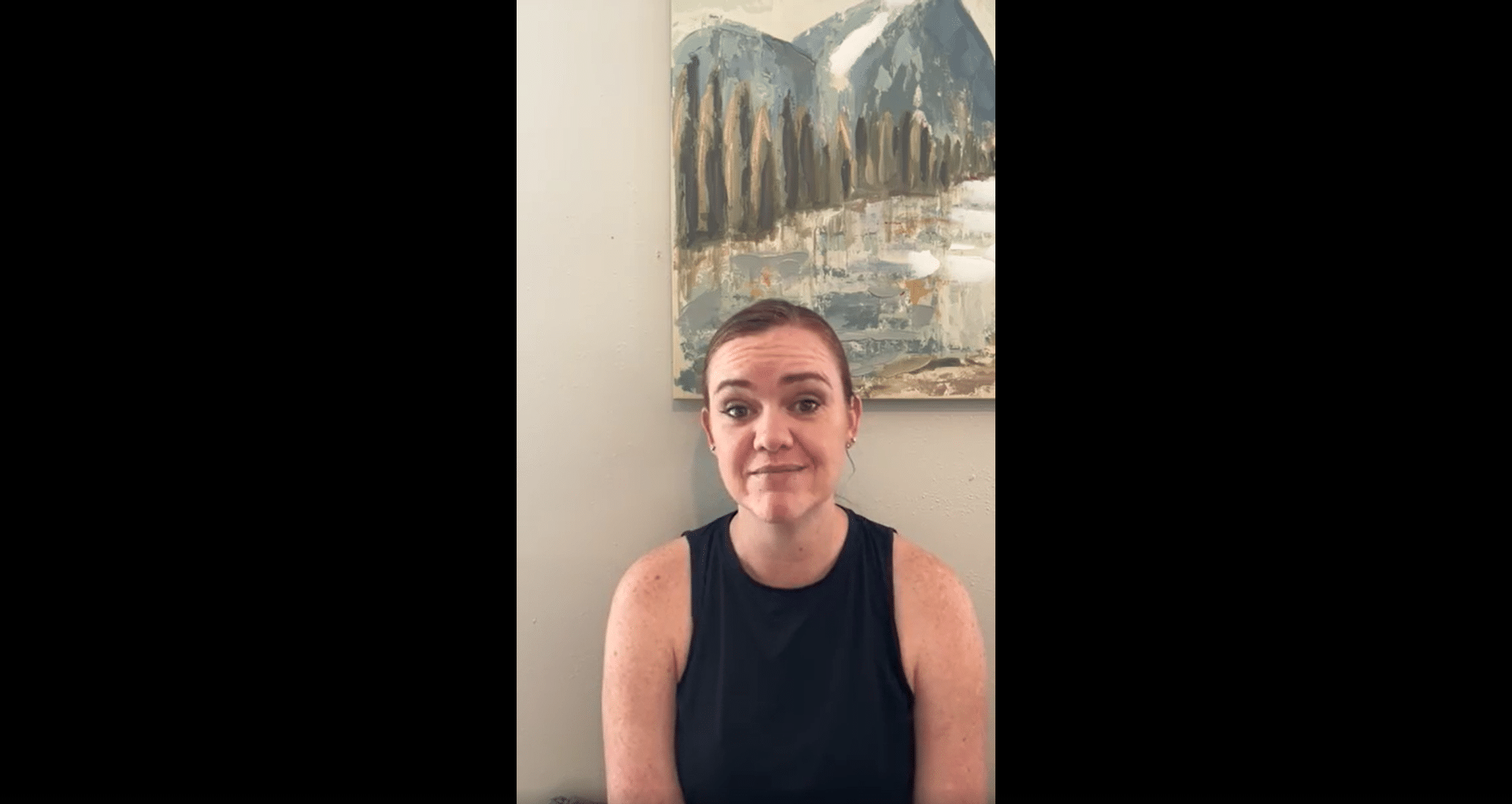 Emily Reilly sitting in her office