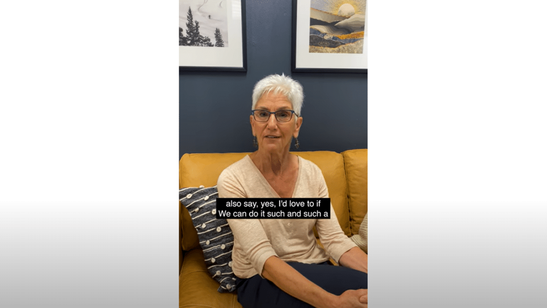 Psychologist, Roz Kalb sitting on couch