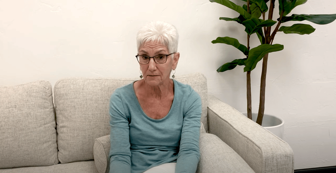 Psychologist, Roz Kalb sitting on a couch
